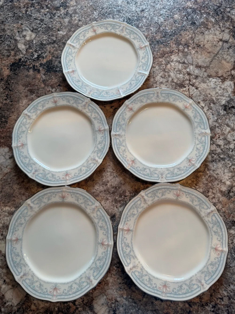 Noritake Crown Flower Dinnerware with Pale Blue and Soft Pink Floral Border